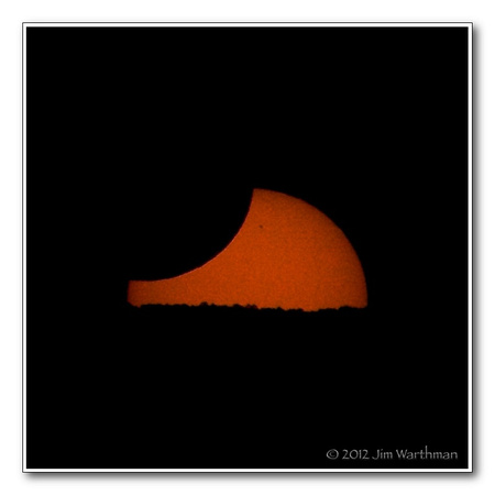 Sunset with Partial Eclipse